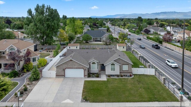 2718 W Southpointe Rd, South Jordan, UT 84095 - aerial view of residential area with a mountainous background