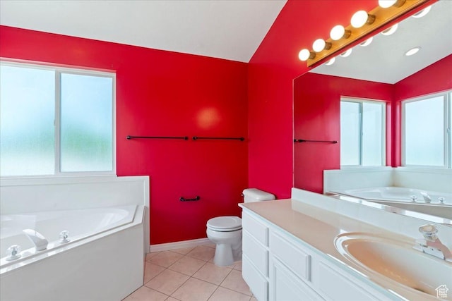 2718 W Southpointe Rd, South Jordan, UT 84095 - full bath featuring vanity, a garden tub, toilet, tile patterned floors, and baseboards