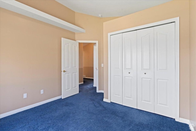 2718 W Southpointe Rd, South Jordan, UT 84095 - unfurnished bedroom featuring dark carpet, baseboards, and a closet