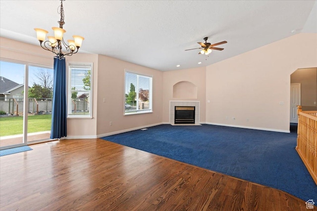 2718 W Southpointe Rd, South Jordan, UT 84095 - unfurnished living room featuring ceiling fan, plenty of natural light, baseboards, and wood finished floors
