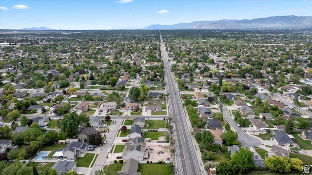 2718 W Southpointe Rd, South Jordan, UT 84095 - aerial view of property's location with a mountain backdrop, a major roadway, and nearby suburban area