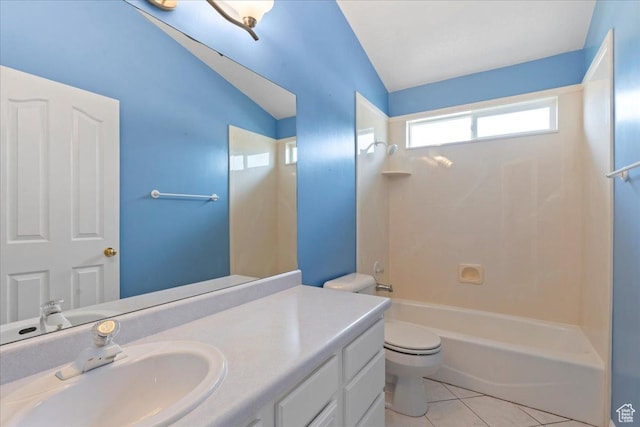 2718 W Southpointe Rd, South Jordan, UT 84095 - full bathroom featuring vaulted ceiling, vanity, toilet,  shower combination, and tile patterned floors