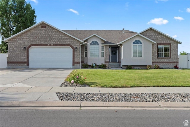 2718 W Southpointe Rd, South Jordan, UT 84095 - ranch-style home with an attached garage, brick siding, and driveway