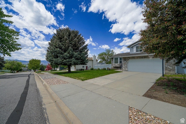 1213 E Earl Way S, Sandy, UT 84094 - view of front of home featuring stone siding, concrete driveway, a front lawn, and a garage