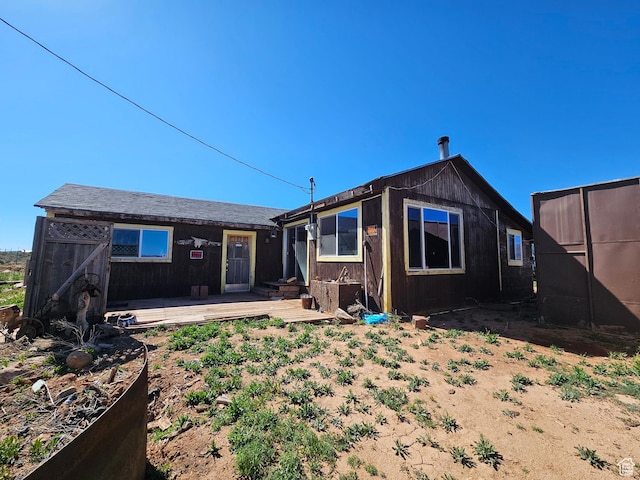 44600 W Hwy 40, Fruitland, UT 84027 - rear view of house with a wooden deck