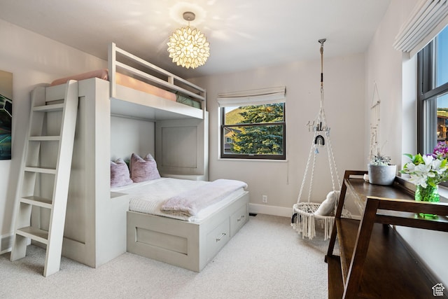 1753 Teal Dr, Kimball Junction, UT 84098 - bedroom with light colored carpet, a chandelier, and baseboards