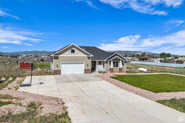 1038 S 4575 W, Cedar City, UT 84720 - view of front facade featuring a mountain view and concrete driveway