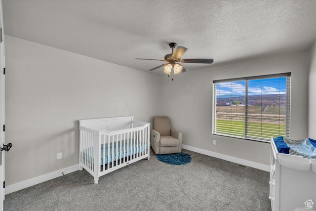 1038 S 4575 W, Cedar City, UT 84720 - bedroom featuring carpet floors, baseboards, ceiling fan, and a textured ceiling
