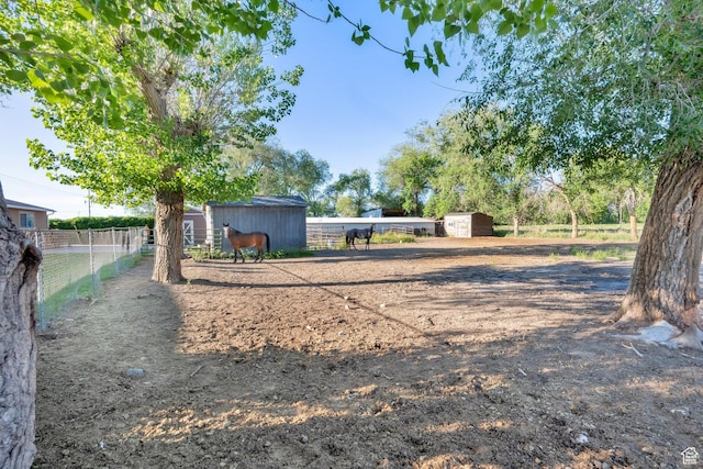 2848 N 2200 W, Salt Lake City, UT 84116 - view of community featuring an outbuilding and an exterior structure