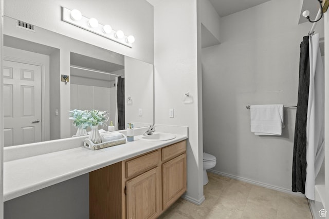 900 Bitner Rd Unit A33, Park City, UT 84098 - bathroom featuring vanity, toilet, a shower with curtain, baseboards, and tile patterned floors