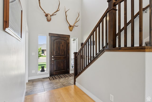 2391 S 330 E, Heber City, UT 84032 - entryway featuring stairway, baseboards, a high ceiling, and wood finished floors