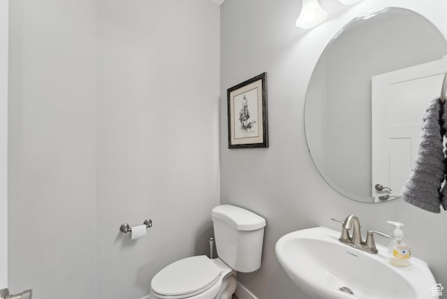 2391 S 330 E, Heber City, UT 84032 - bathroom featuring a sink, toilet, and baseboards