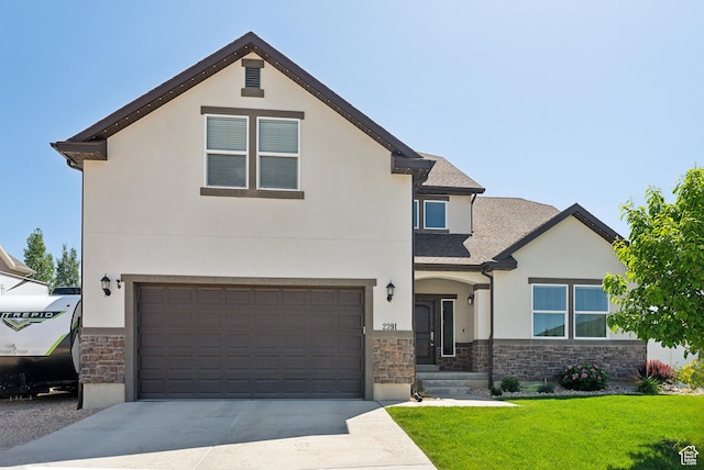 2391 S 330 E, Heber City, UT 84032 - view of front of property with stone siding, stucco siding, a front lawn, driveway, and an attached garage