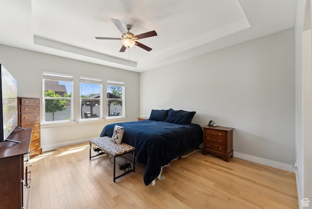 2391 S 330 E, Heber City, UT 84032 - bedroom with a tray ceiling, baseboards, light wood-style flooring, and a ceiling fan
