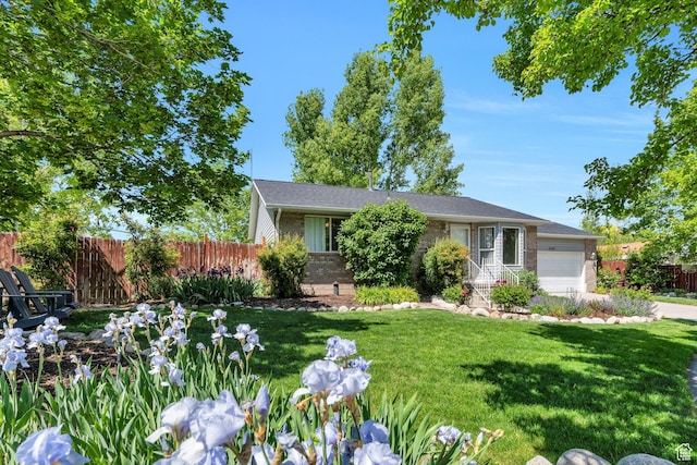 5144 W Wheatcrest Cir, West Jordan, UT 84081 - view of front of house featuring brick siding and a garage