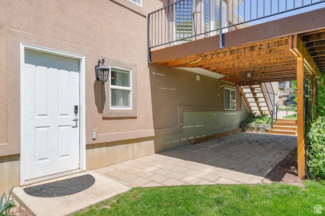 1291 E 5630 S, South Ogden, UT 84403 - property entrance featuring a patio and stucco siding