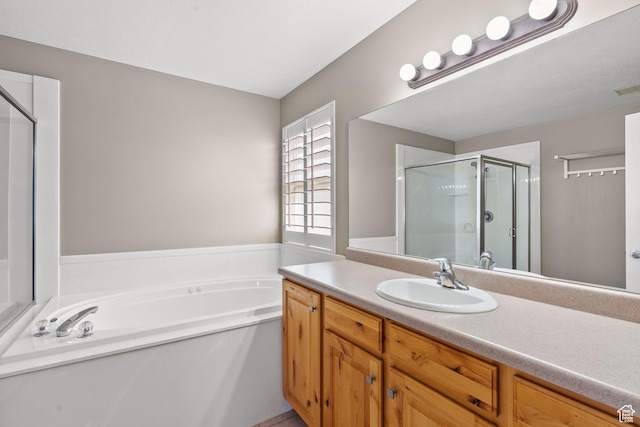 1291 E 5630 S, South Ogden, UT 84403 - bathroom featuring a shower stall, a garden tub, and vanity