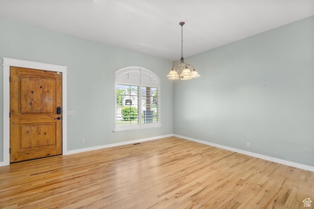 1291 E 5630 S, South Ogden, UT 84403 - unfurnished room with light wood-style floors, baseboards, and a chandelier