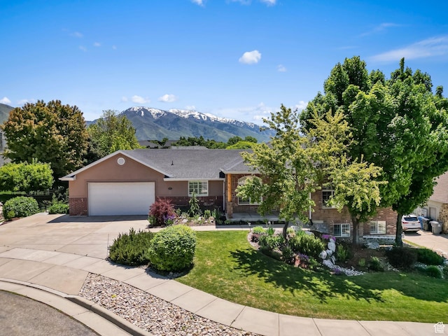 1291 E 5630 S, South Ogden, UT 84403 - ranch-style house with brick siding, an attached garage, concrete driveway, and a front lawn
