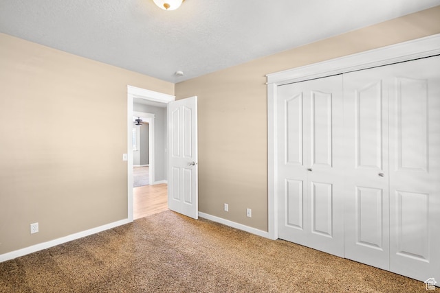 1291 E 5630 S, South Ogden, UT 84403 - unfurnished bedroom featuring carpet floors, baseboards, and a closet