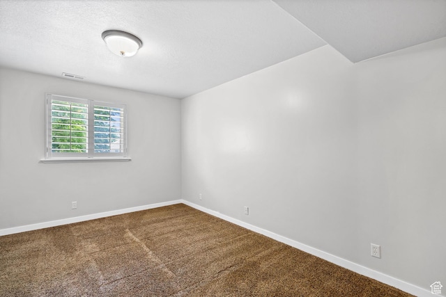 1291 E 5630 S, South Ogden, UT 84403 - carpeted spare room with baseboards and a textured ceiling