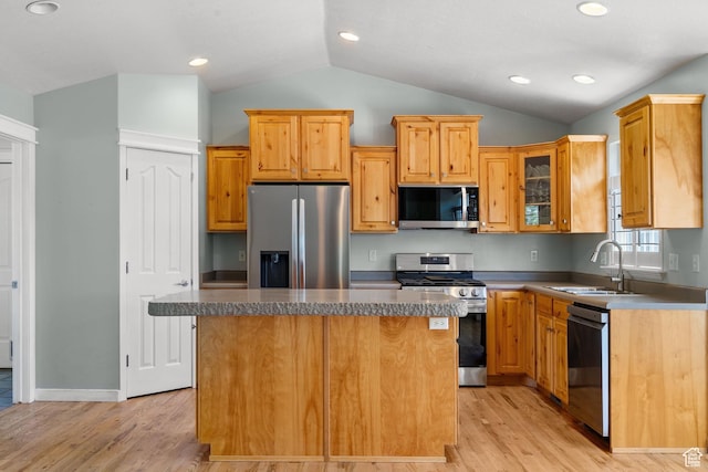 1291 E 5630 S, South Ogden, UT 84403 - kitchen with stainless steel appliances, lofted ceiling, a sink, light wood finished floors, and a kitchen island