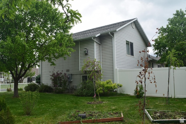 963 W Rainbow Dr, Logan, UT 84321 - view of home's exterior with a vegetable garden