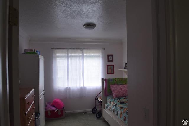 963 W Rainbow Dr, Logan, UT 84321 - bedroom featuring carpet floors, ornamental molding, a textured ceiling, and baseboards