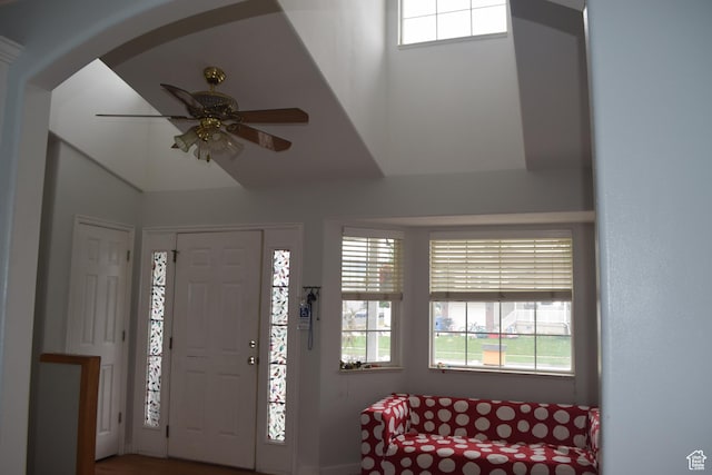 963 W Rainbow Dr, Logan, UT 84321 - foyer featuring healthy amount of natural light, ceiling fan, high vaulted ceiling, and arched walkways