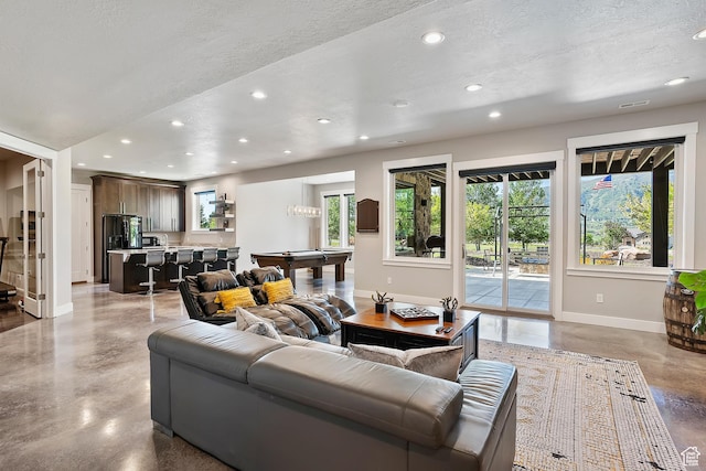 3858 E Eagle Ct, Eden, UT 84310 - living area featuring recessed lighting, billiards, baseboards, concrete floors, and a textured ceiling