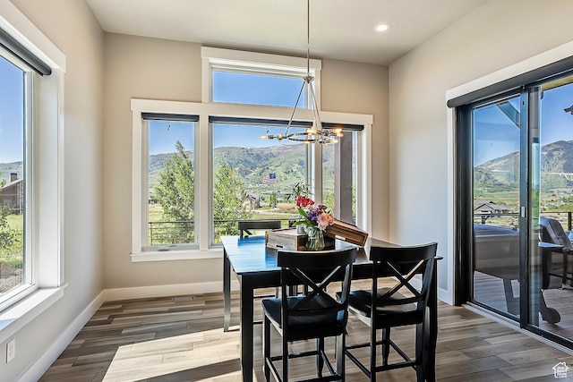 3858 E Eagle Ct, Eden, UT 84310 - dining area featuring a chandelier, healthy amount of natural light, and recessed lighting