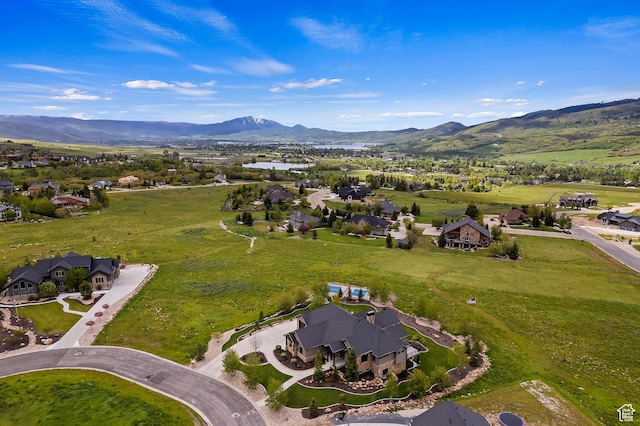 3858 E Eagle Ct, Eden, UT 84310 - aerial view of property's location featuring a mountain backdrop and nearby suburban area