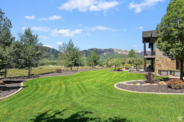 3858 E Eagle Ct, Eden, UT 84310 - view of green lawn featuring a mountain view and a balcony