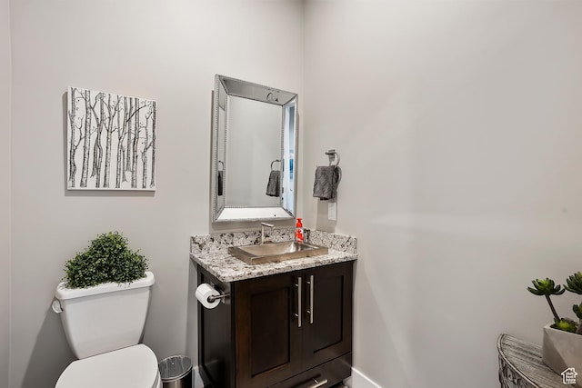 3858 E Eagle Ct, Eden, UT 84310 - bathroom with vanity, toilet, and baseboards