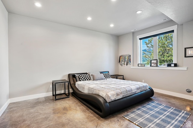 3858 E Eagle Ct, Eden, UT 84310 - bedroom with finished concrete flooring, recessed lighting, and baseboards