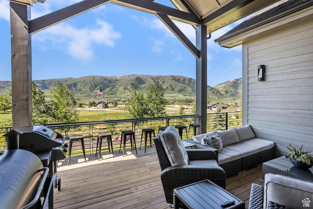 3858 E Eagle Ct, Eden, UT 84310 - wooden deck with a mountain view, an outdoor living space, and grilling area