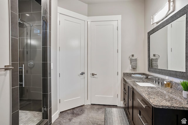 3858 E Eagle Ct, Eden, UT 84310 - full bath featuring a stall shower, vanity, and finished concrete flooring