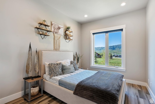 3858 E Eagle Ct, Eden, UT 84310 - bedroom featuring baseboards, wood finished floors, recessed lighting, and a mountain view