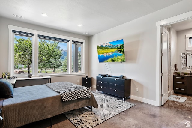 3858 E Eagle Ct, Eden, UT 84310 - bedroom with concrete floors, baseboards, and recessed lighting