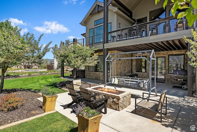 3858 E Eagle Ct, Eden, UT 84310 - view of patio with a fire pit and a balcony