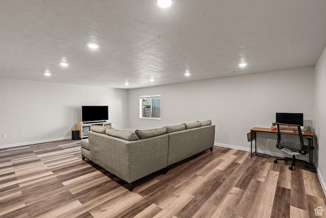3932 S Sennie Dr W, Magna, UT 84044 - living area with recessed lighting, wood finished floors, baseboards, an office area, and a textured ceiling