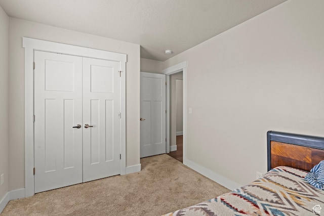 3932 S Sennie Dr W, Magna, UT 84044 - carpeted bedroom featuring baseboards and a closet