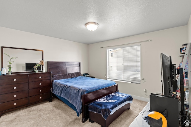 3932 S Sennie Dr W, Magna, UT 84044 - bedroom featuring light colored carpet, a textured ceiling, and baseboards