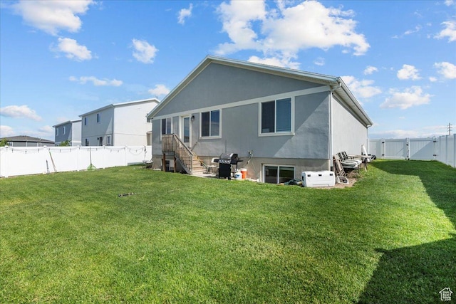 3932 S Sennie Dr W, Magna, UT 84044 - back of property with a gate and stucco siding