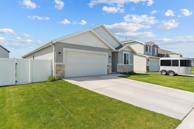 3932 S Sennie Dr W, Magna, UT 84044 - view of front of home with stone siding, concrete driveway, a garage, and stucco siding