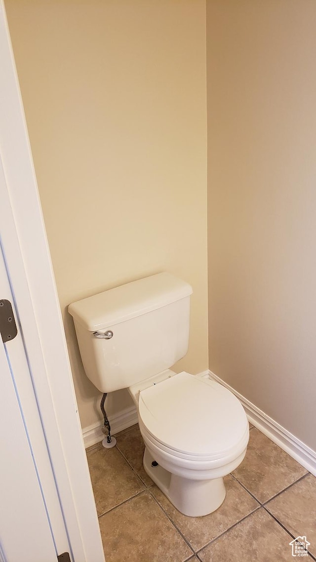 125 W 870 N, Orem, UT 84057 - bathroom featuring baseboards, toilet, and tile patterned floors