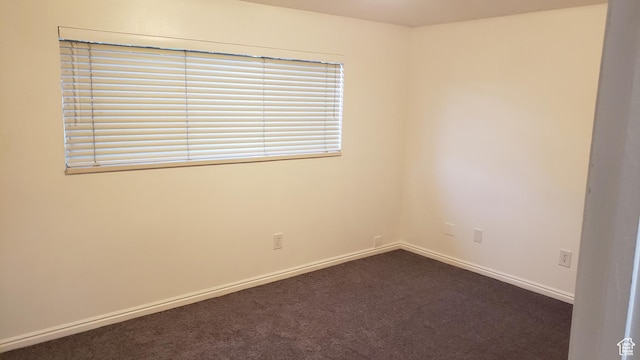 125 W 870 N, Orem, UT 84057 - spare room featuring dark carpet and baseboards