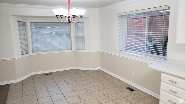 125 W 870 N, Orem, UT 84057 - unfurnished dining area featuring a chandelier, ornamental molding, light tile patterned floors, and baseboards