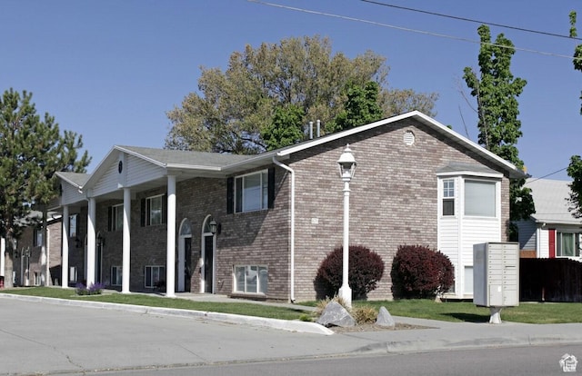 125 W 870 N, Orem, UT 84057 - view of side of property featuring mail area and brick siding
