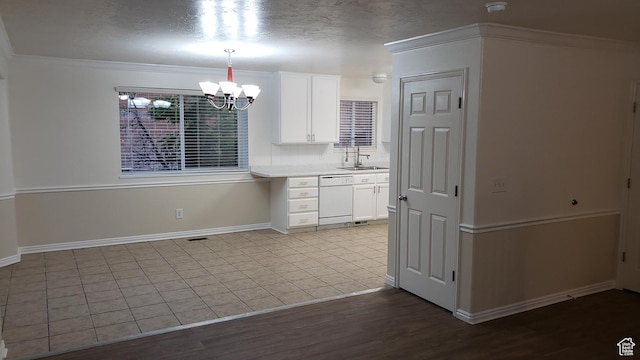 125 W 870 N, Orem, UT 84057 - kitchen with a sink, dishwasher, a chandelier, white cabinets, and light countertops